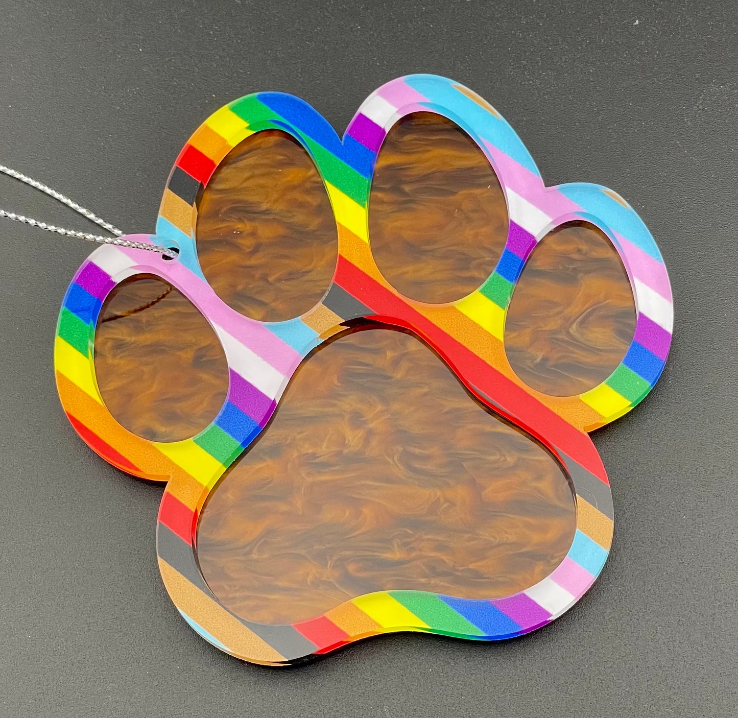 
                  
                    Be Proud - Pride Paw Ornament
                  
                