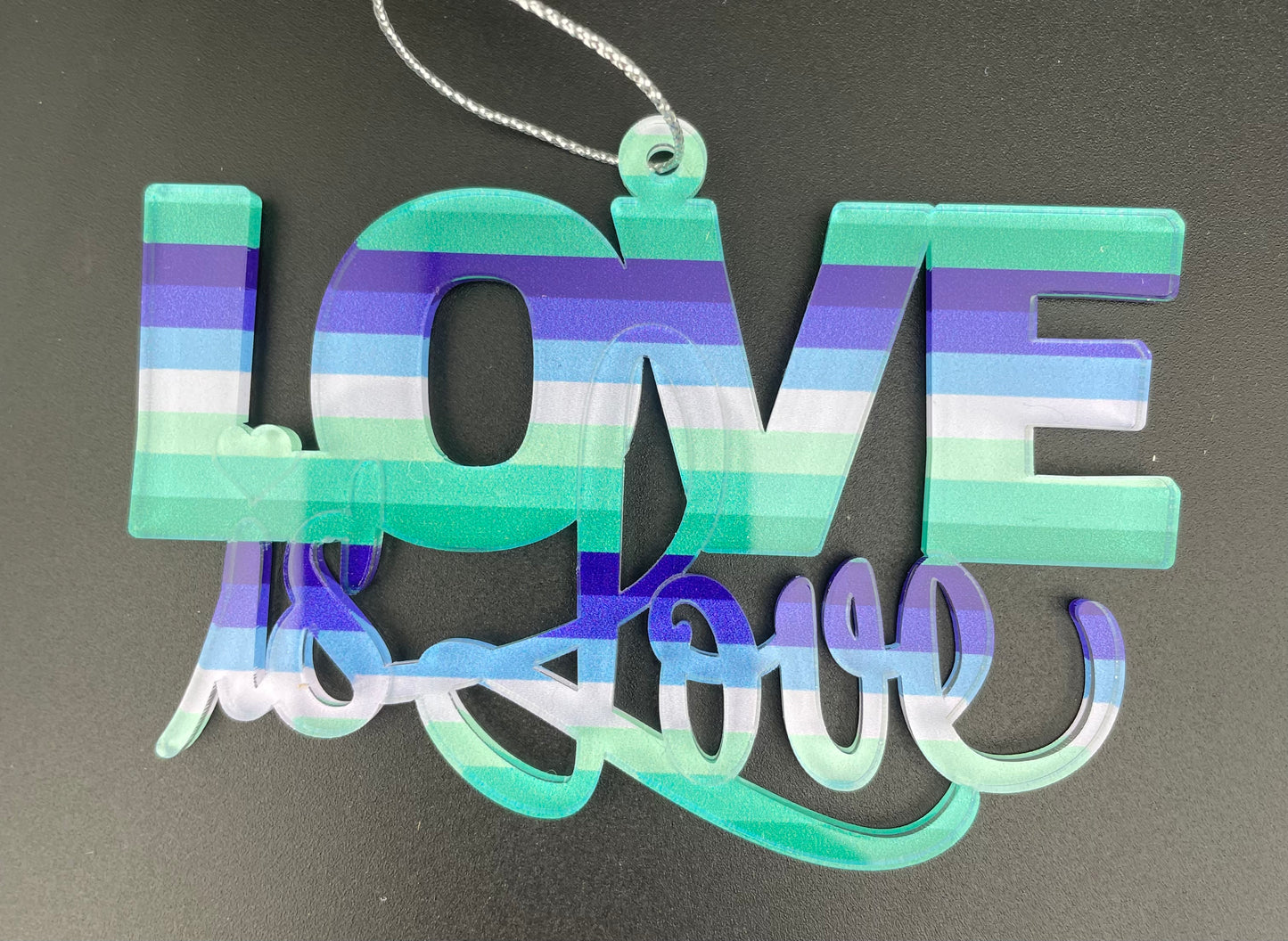 
                  
                    Be Proud - Love is Love Ornament + Lanyard
                  
                
