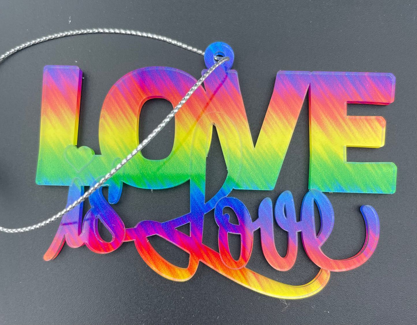 
                  
                    Be Proud - Love is Love Ornament + Lanyard
                  
                