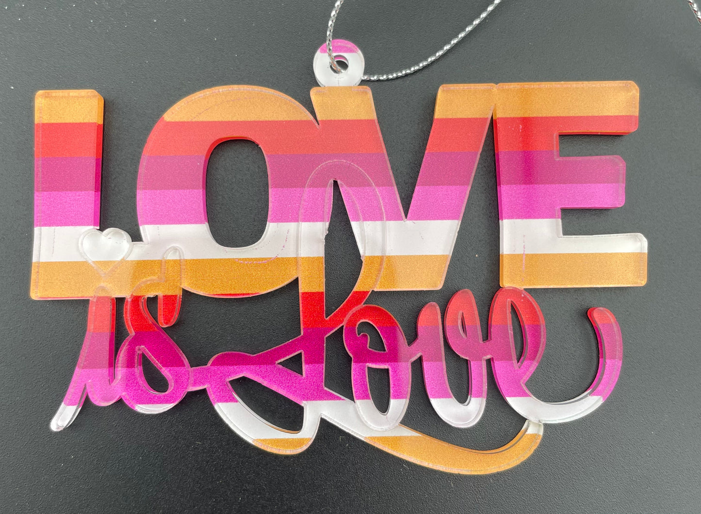 
                  
                    Be Proud - Love is Love Ornament + Lanyard
                  
                